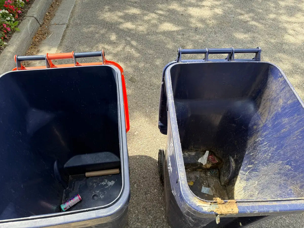 Two residential rollaway bins together before BC Bin Clean service